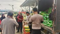 Polri Hadir untuk Masyarakat, Polres Kutim Gelar Operasi Gerakan Pangan Murah di Desa Maloy